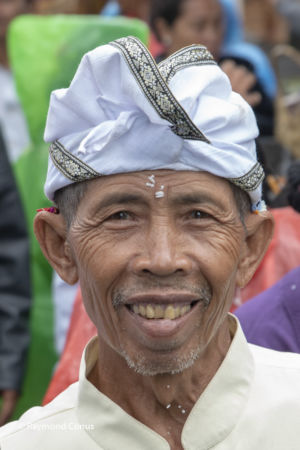 Pilgrim at Pura Goa Lawah temple, Bali, 2018